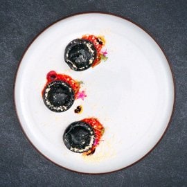 Black Squid Ink Ravioli with Szechuan Grilled Chicken Filling Black Squid Ink Ravioli with Szechuan Grilled Chicken Filling
