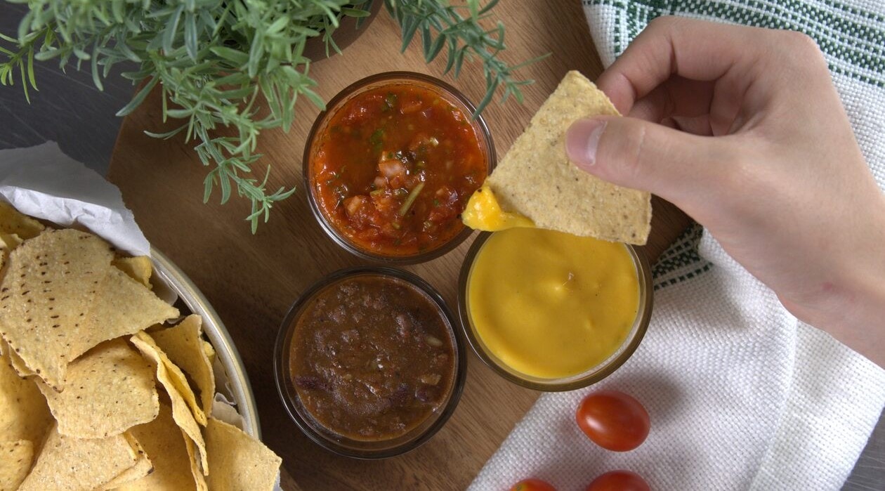 Nachos served with Tomato Salsa, Chili Con Carne & Cheese Dips – - Recipe