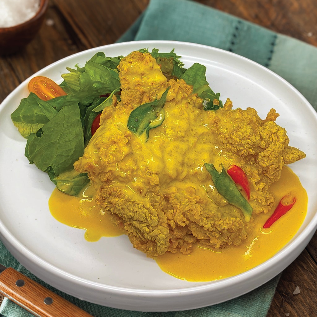 Crispy Chicken Chop with Creamy Salted Egg Sauce Crispy Chicken Chop with Creamy Salted Egg Sauce