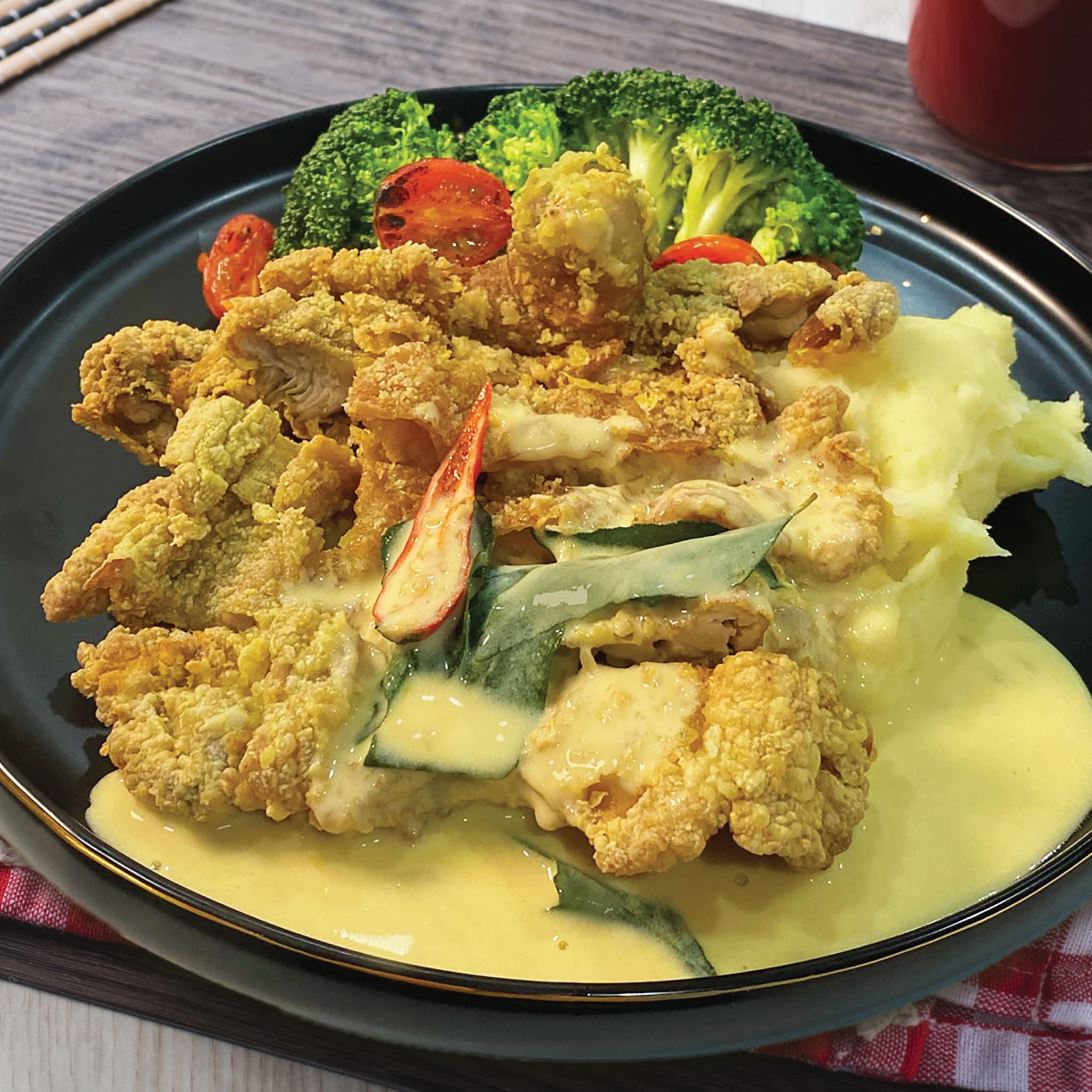 Cheesy Chicken Chop with Salted Egg Sauce Cheesy Chicken Chop with Salted Egg Sauce